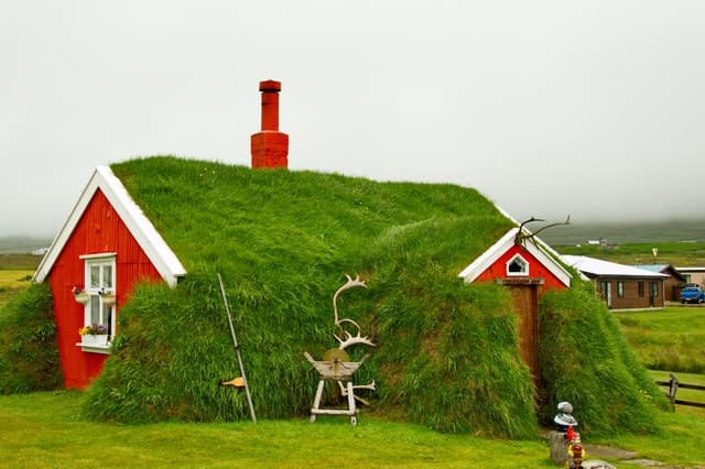 Red Turf House In Iceland